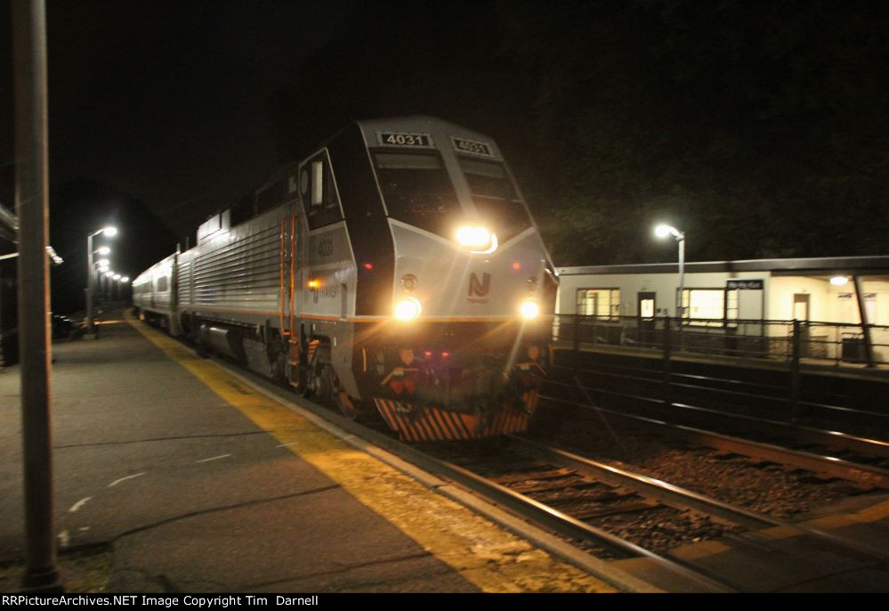 NJT 4011 heads west after stop.